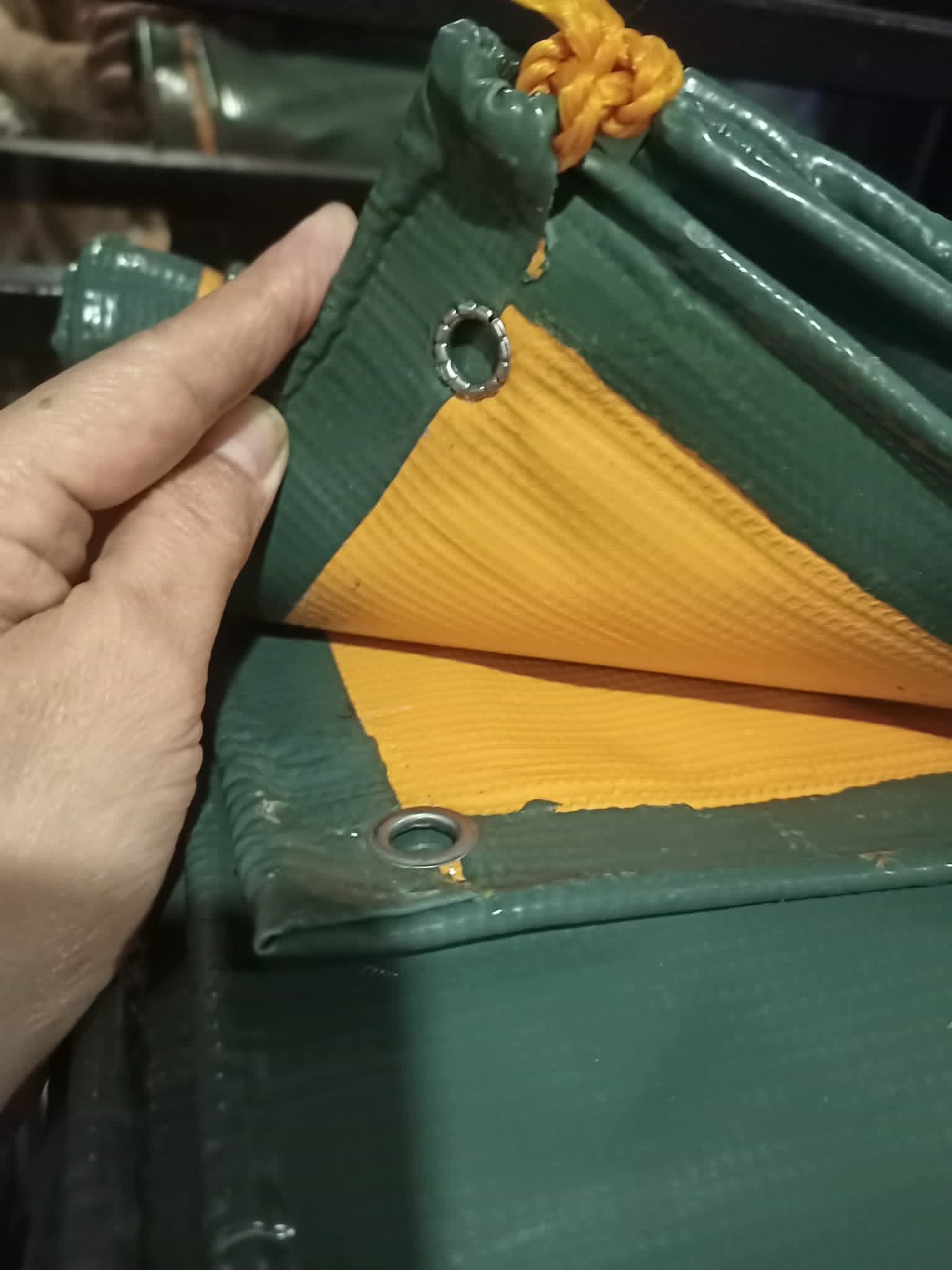 Tarpulin grommet detail